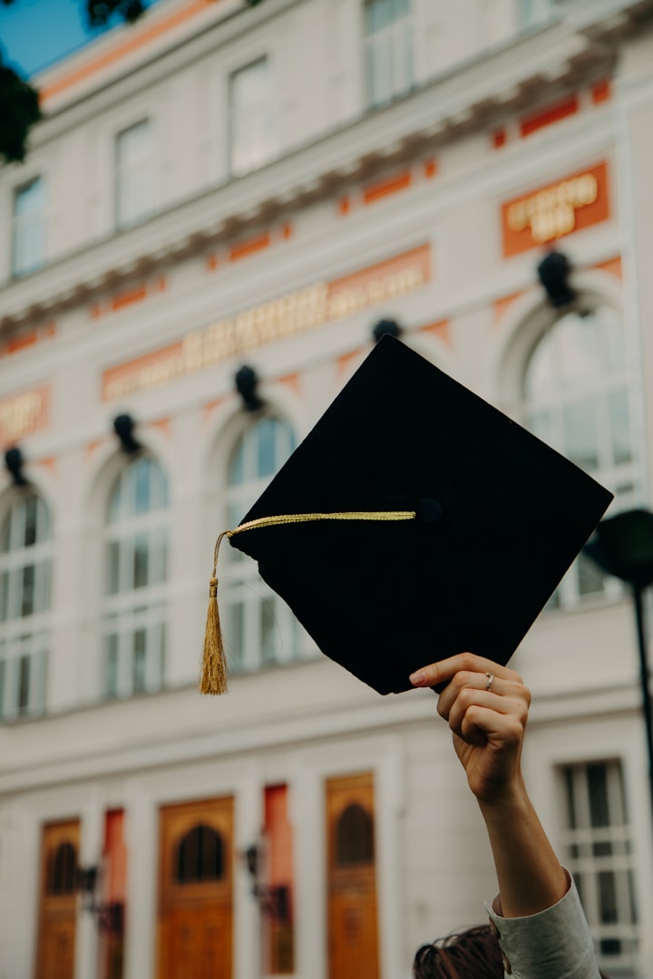 High school graduation cap and diploma
